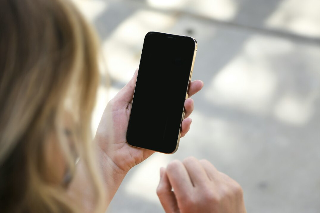 woman checking phone